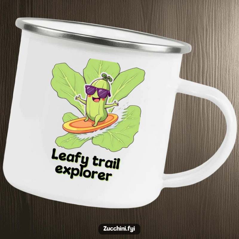 Funny zucchini in sunglasses surfing on a lettuce leaf on a camping mug, cool outdoor fun.