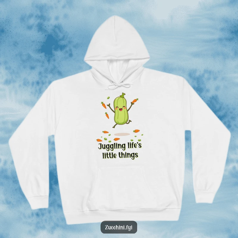 Funny zucchini with small legs joyfully juggling tiny carrots and peas, a cozy and humorous hoodie.