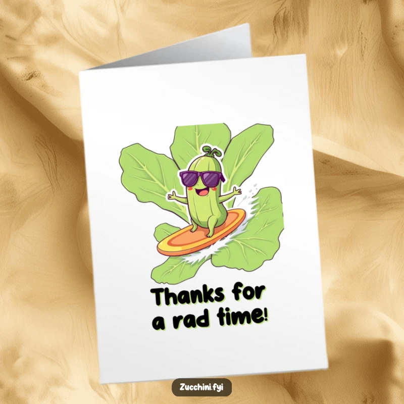 Funny Free Printable thank you card: a zucchini with sunglasses surfs a lettuce leaf, sending thanks with a cool attitude.