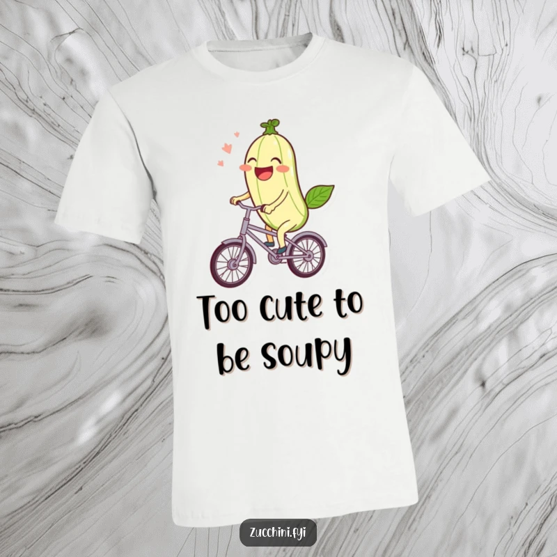 Funny T-Shirt: A laughing kawaii zucchini rides a miniature bicycle with pure joy and cheerful energy.